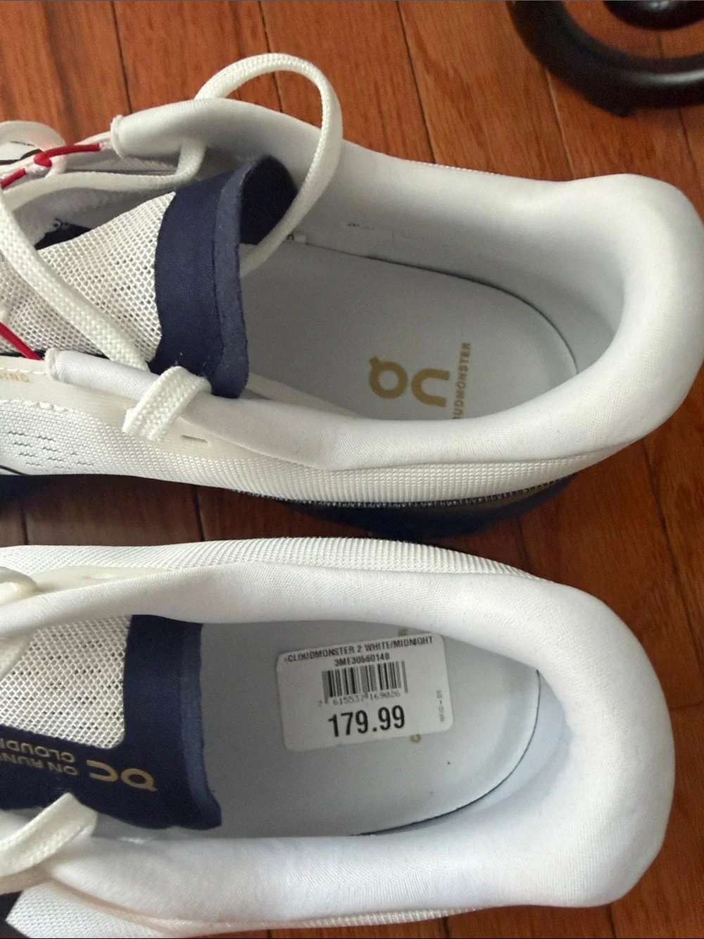 On Running White Athletic Running Shoes with Navy and Red Accents